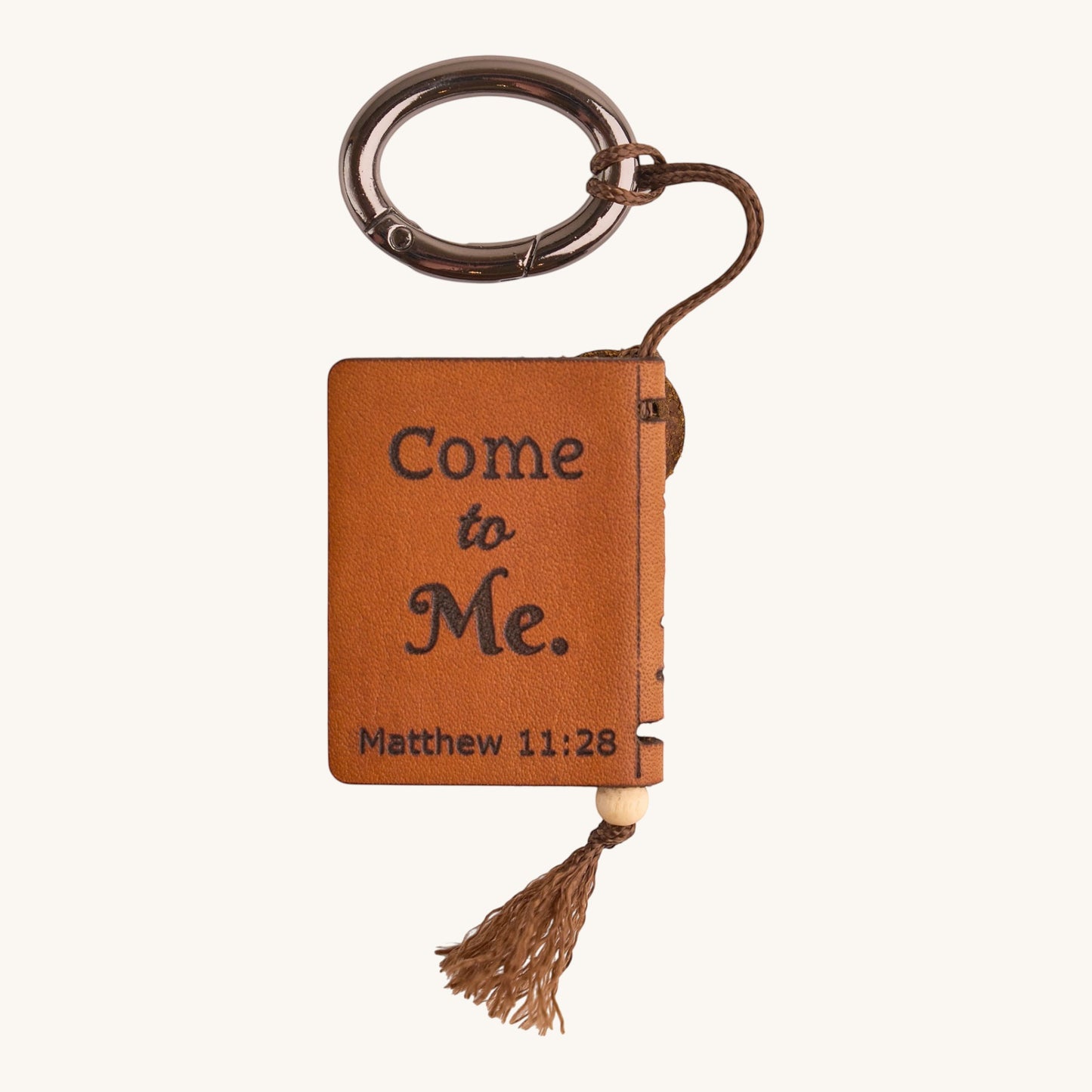 Holy Matters vegetable-tanned leather mini Bible keepsake with Matthew 11:28 engraving and tassel keyring