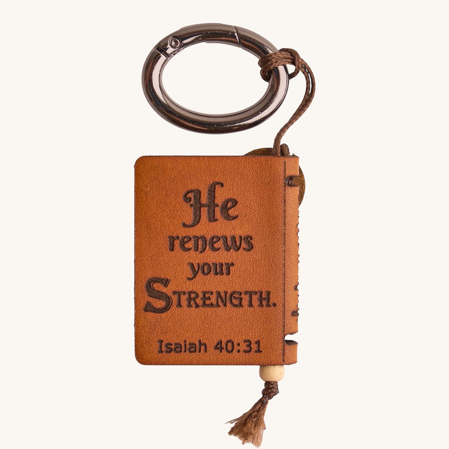 Holy Matters vegetable-tanned leather mini Bible keepsake with Isaiah 40:31 scripture engraving and metal keyring