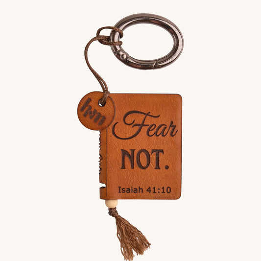 Holy Matters vegetable-tanned leather mini Bible keepsake keychain engraved with Isaiah 41:10 Fear Not text