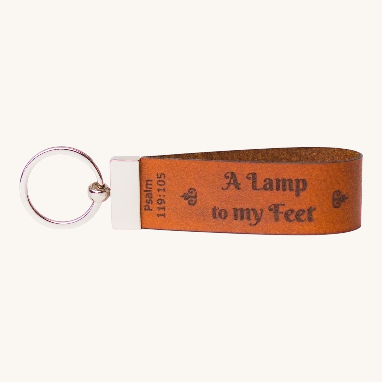 Holy Matters vegetable-tanned leather keychain engraved with Psalm 119:105 A Lamp to my feet