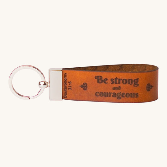 Holy Matters vegetable-tanned leather keychain embossed with Deuteronomy 31:6 Be strong and courageous scripture