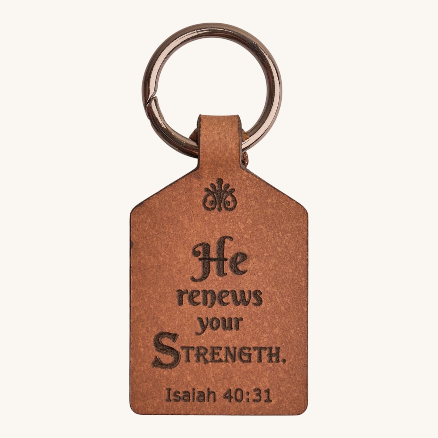 Holy Matters handcrafted vegetable-tanned leather keychain engraved with Isaiah 40:31 scripture and metal ring.