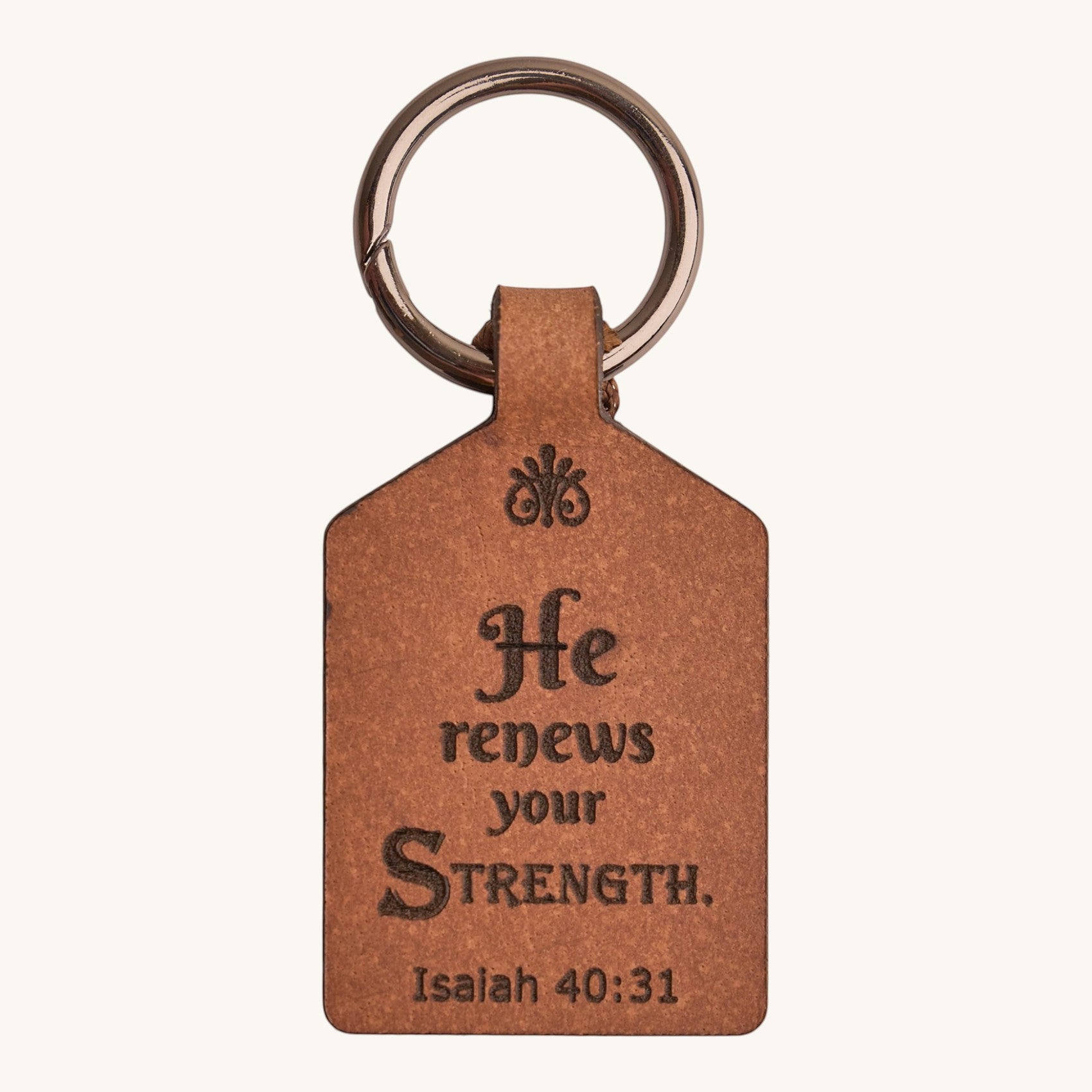 Holy Matters handcrafted vegetable-tanned leather keychain engraved with Isaiah 40:31 scripture and metal ring.
