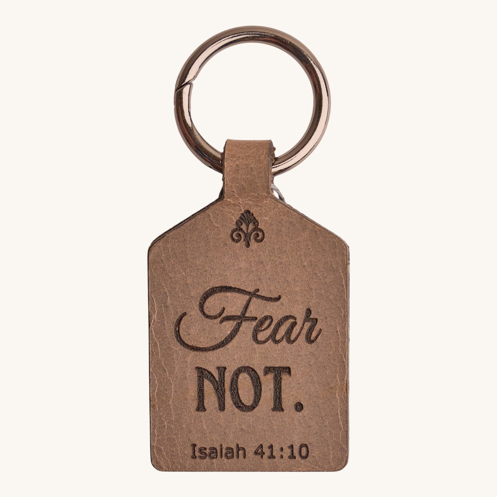 Holy Matters handcrafted vegetable-tanned leather keychain engraved with Fear Not and Isaiah 41:10 scripture.