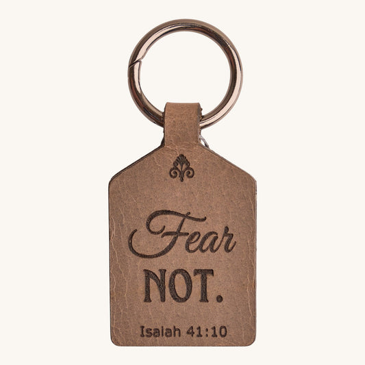 Holy Matters handcrafted vegetable-tanned leather keychain engraved with Fear Not and Isaiah 41:10 scripture.
