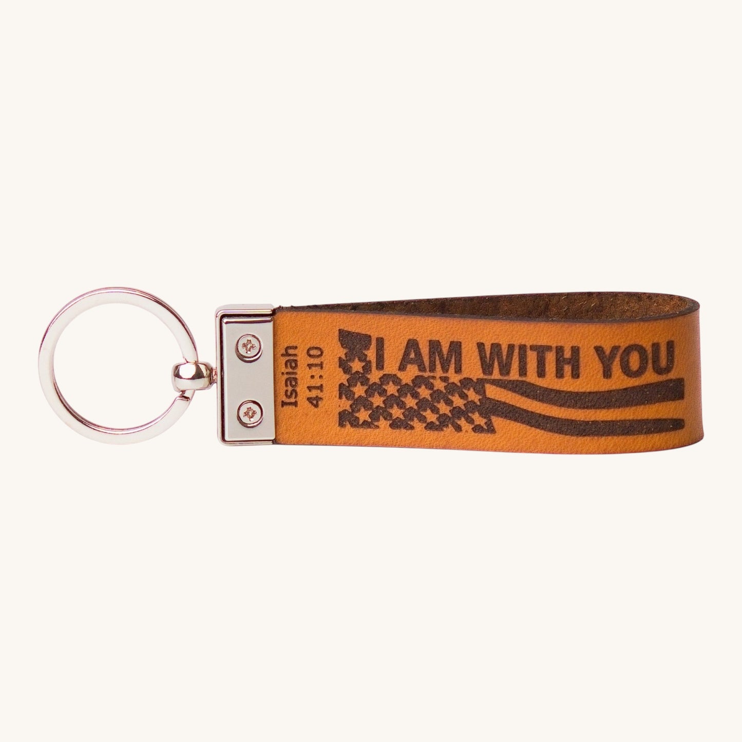 Holy Matters vegetable-tanned leather keychain engraved with Isaiah 41:10 Scripture and a flag design